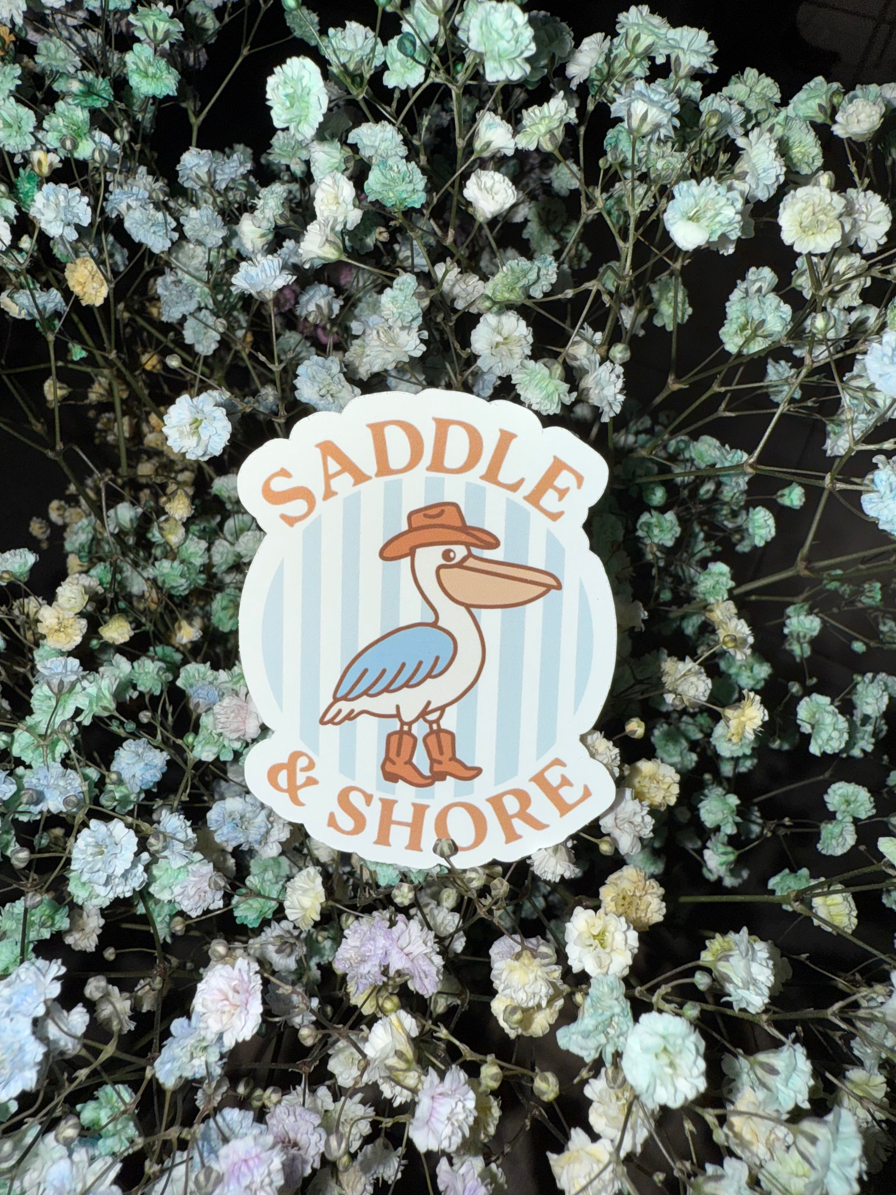 Saddle & Shore Sticker - Cowboy Pelican Logo
